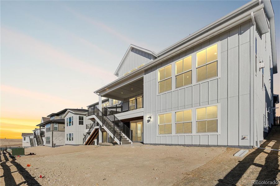 Exterior details and patio area of a home in Gallery at The Canyons, Castle Pines (Image 3).
