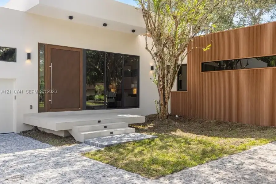 Exterior details and patio area of a home in , Pinecrest (Image 33). Exterior details and patio area of a home in , Pinecrest (Image 33).