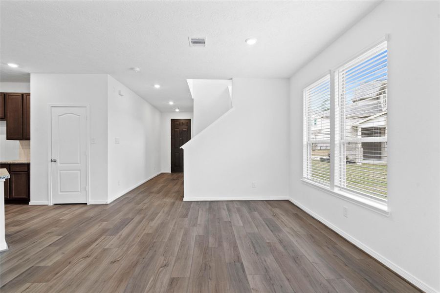 Start your day off right with a cup of coffee sitting with your family in the lovely dining area! Featuring large windows with privacy blinds, custom paint, tile flooring and recessed lighting. Start your day off right with a cup of coffee sitting with your family in the lovely dining area! Featuring large windows with privacy blinds, custom paint, tile flooring and recessed lighting.