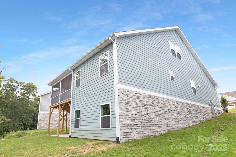 Front exterior of a new home in Edgewater - The Cottages, Lancaster, SC, highlighting curb appeal (Image 23).