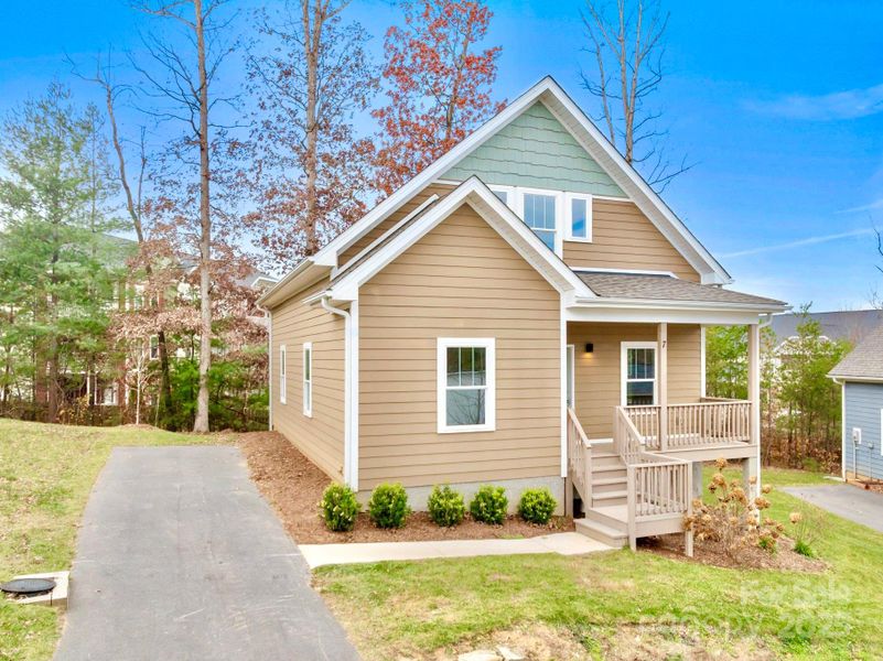 Front exterior of a new home in , Arden, NC, highlighting curb appeal (Image 2).