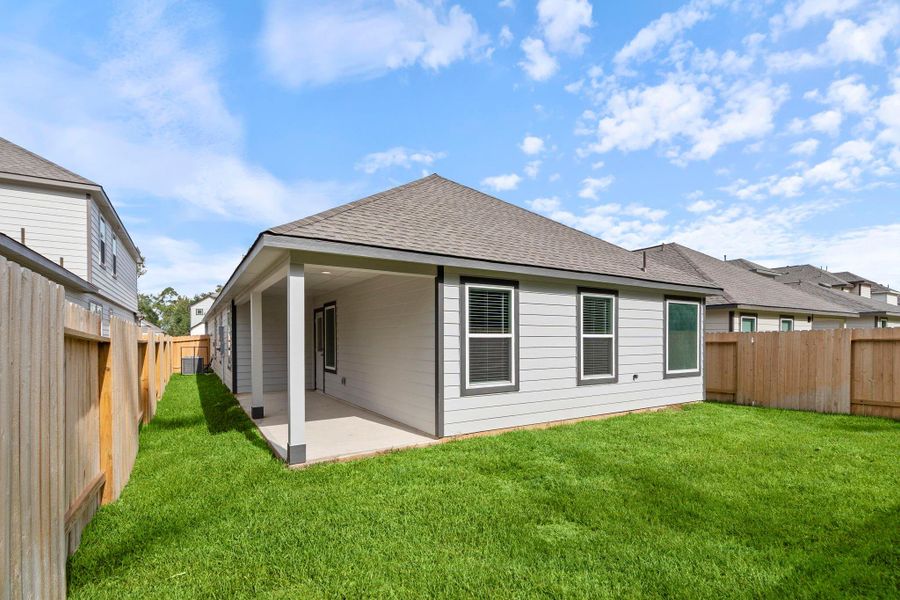 Exterior details and patio area of a home in Cypresswood Landing, Humble (Image 3).
