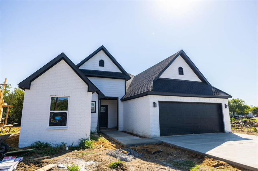 View of front facade with a garage