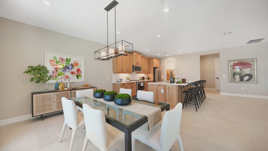 Representative furnished interior of a home built from the Artistry by Neal Communities in SkySail, Naples (Image 16).