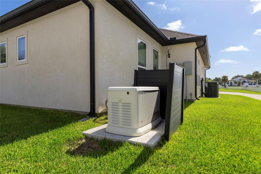 You will never have to worry about being without power with this Generac generator that powers the whole house.Also, there are 2 air conditioners. One on each side of the house to keep it nice and cool. You will never have to worry about being without power with this Generac generator that powers the whole house.Also, there are 2 air conditioners. One on each side of the house to keep it nice and cool.