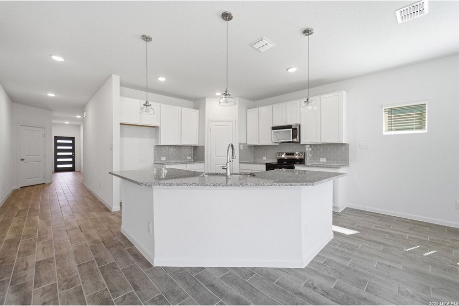 Furnished interior view inside a new home in Laurel Vistas, San Antonio (Image 8).