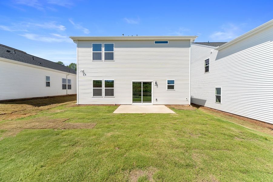 Front exterior of a new home in Richmond Hill, Inman, SC, highlighting curb appeal (Image 19). Front exterior of a new home in Richmond Hill, Inman, SC, highlighting curb appeal (Image 19).