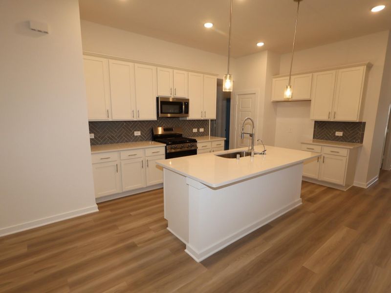 Furnished interior view inside a new home in Pinewood at Grand Texas, New Caney (Image 10).