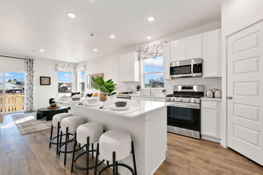 Representative furnished interior of a home built from the Bristol by Baessler Homes in Sage Meadows, Wellington (Image 5). Representative furnished interior of a home built from the Bristol by Baessler Homes in Sage Meadows, Wellington (Image 5).