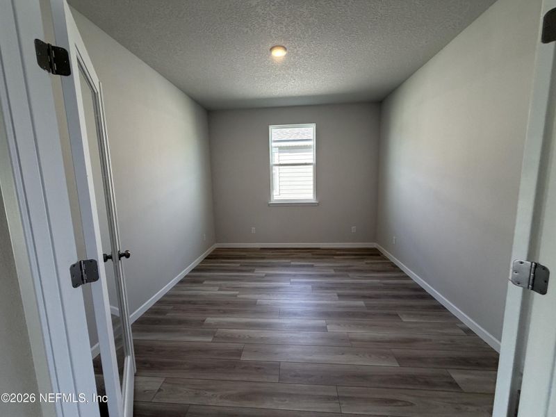 Spacious, unfurnished interior of a new home in The Cypress Series at Reserve East, Flagler Beach (Image 21).