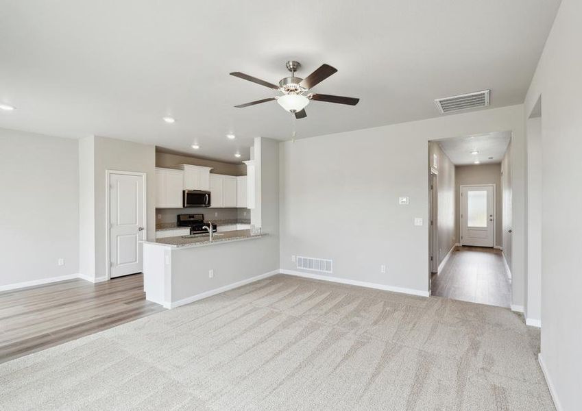 The foyer leads right into the family room.