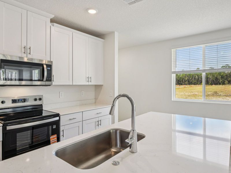 Furnished interior view inside a new home in Ridgehaven - Villas, Ormond Beach (Image 8). Furnished interior view inside a new home in Ridgehaven - Villas, Ormond Beach (Image 8).