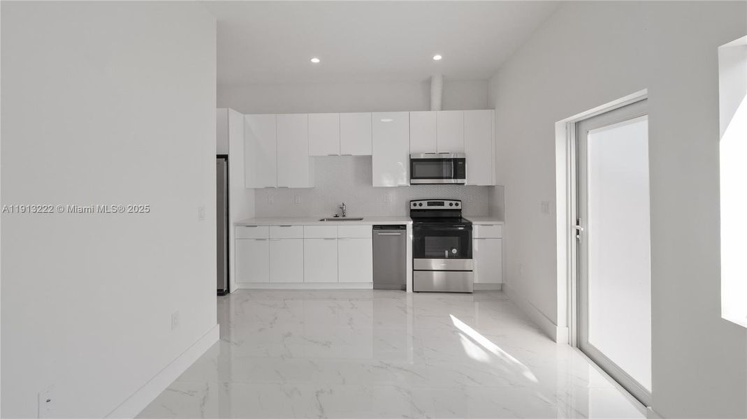 Furnished interior view inside a new home in , Miami (Image 7). Furnished interior view inside a new home in , Miami (Image 7).