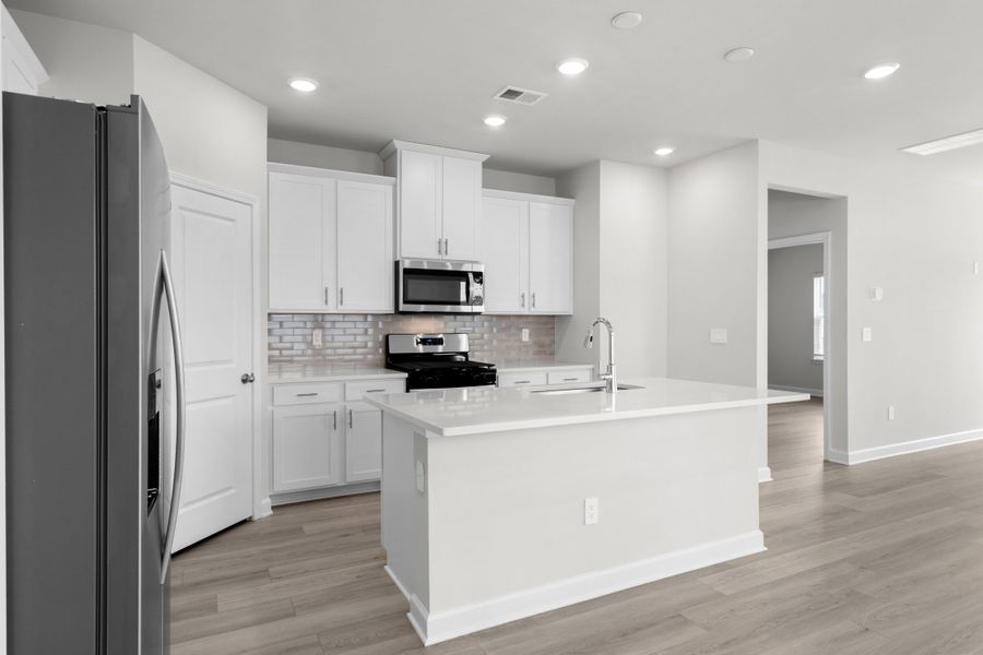 Furnished interior view inside a new home in Cypress Ridge - The Boardwalk Series, Longs (Image 3).