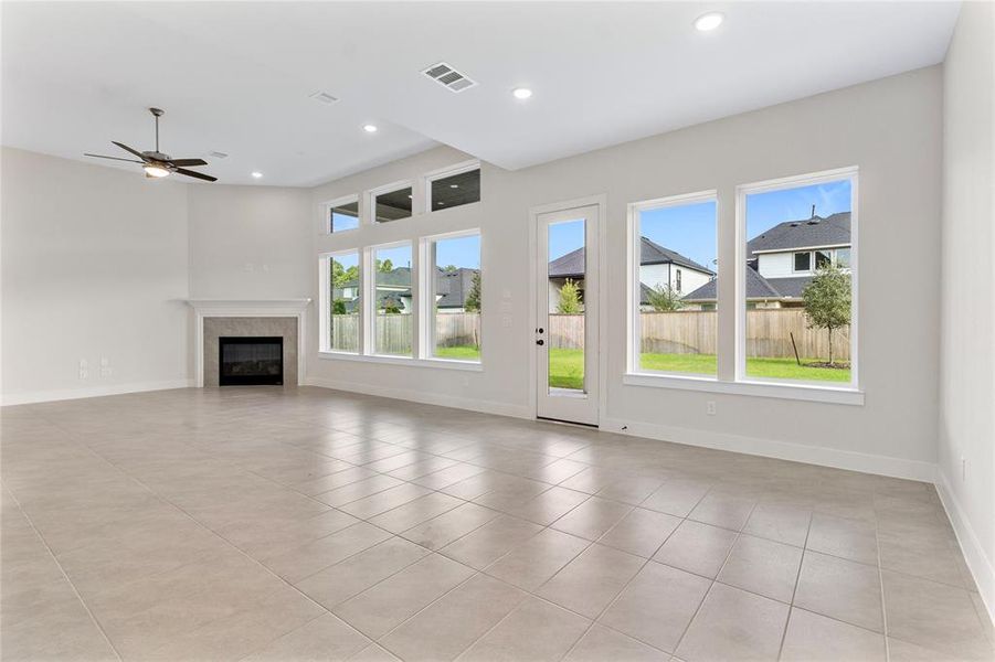 Well lit family room with fireplace