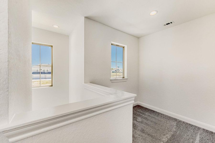 Spacious, unfurnished interior of a new home in The Porch at Du Pre, Buda (Image 21).