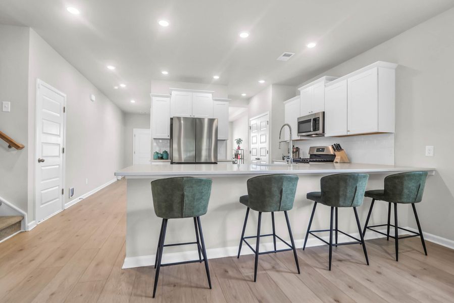 Furnished interior view inside a new home in Sweetgrass at Summers Corner: Arbor Collection, Summerville (Image 12).
