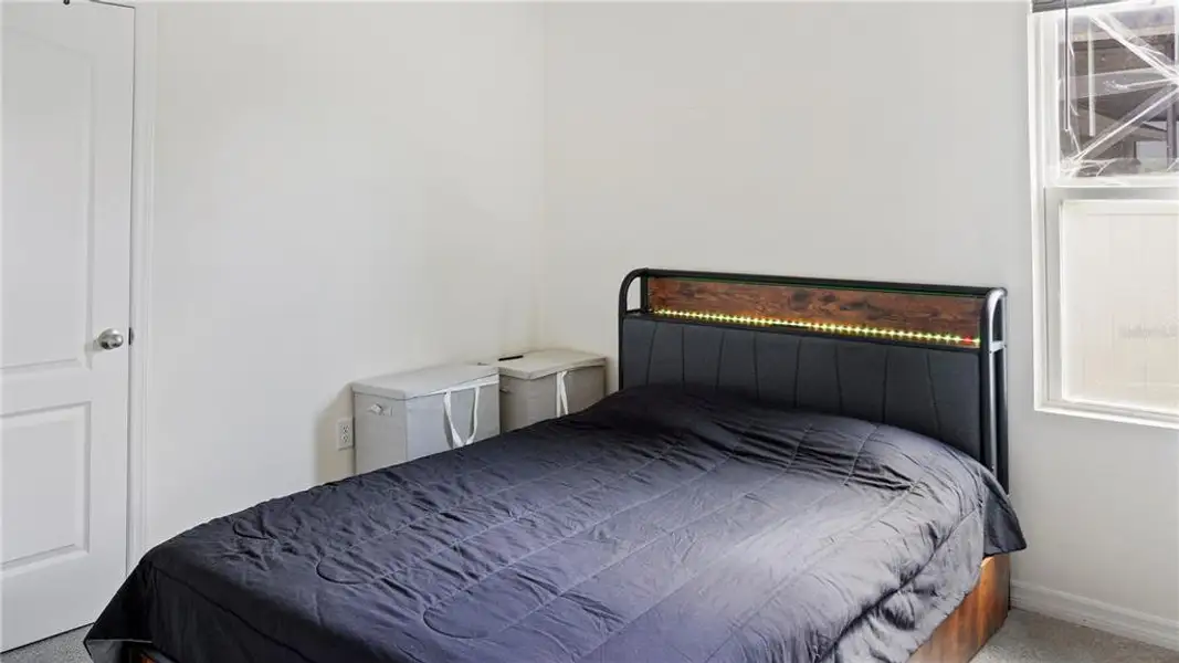 Furnished interior view inside a new home in Charles Cove Express, Davenport (Image 24).