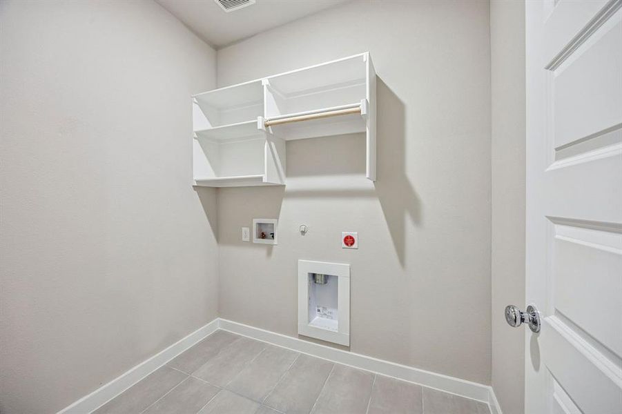 Utility Room in the Willow home plan by Trophy Signature Homes – REPRESENTATIVE PHOTO