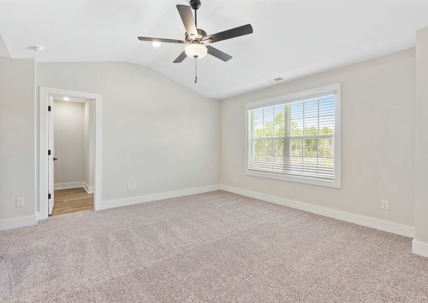 The master bedroom has an en-suite bathroom