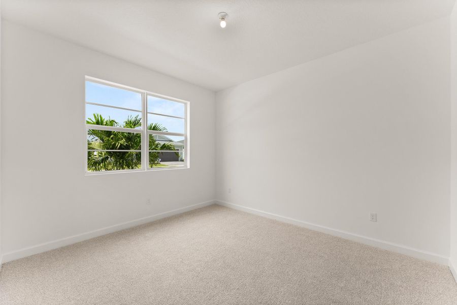 Spacious, unfurnished interior of a new home in Tradition - Cadence, Port St. Lucie (Image 17).