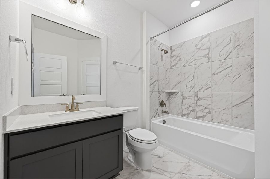 Furnished interior view inside a new home in Sorella, Tomball (Image 31).