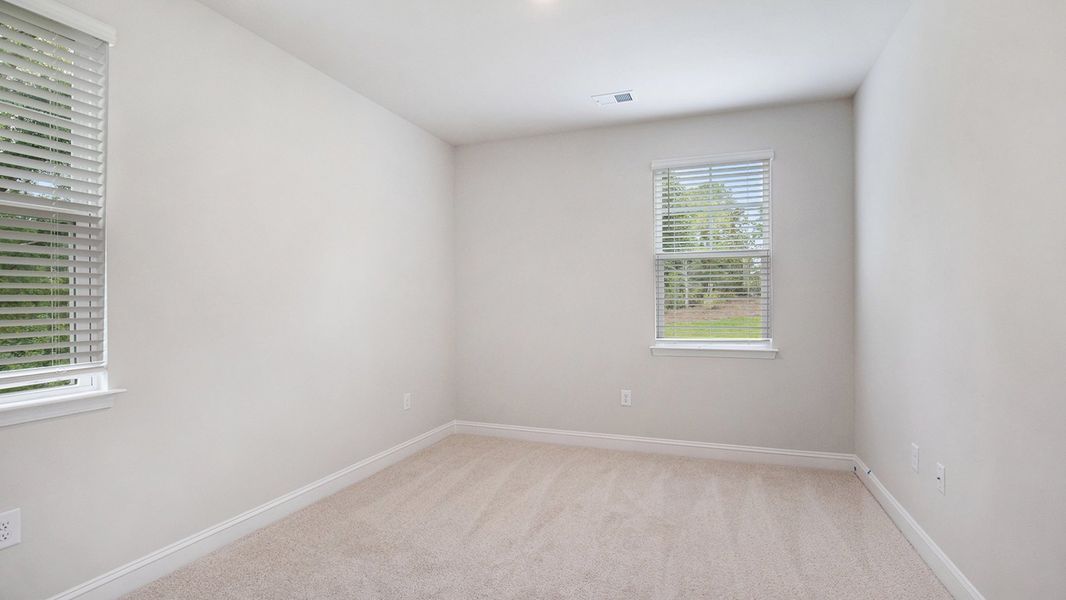 Spacious, unfurnished interior of a new home in Auberon Woods, Conway (Image 17).