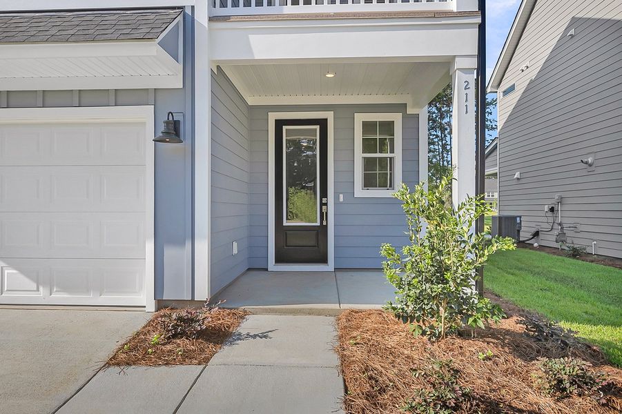 Exterior details and patio area of a home in Pineland Preserve, Summerville (Image 3).