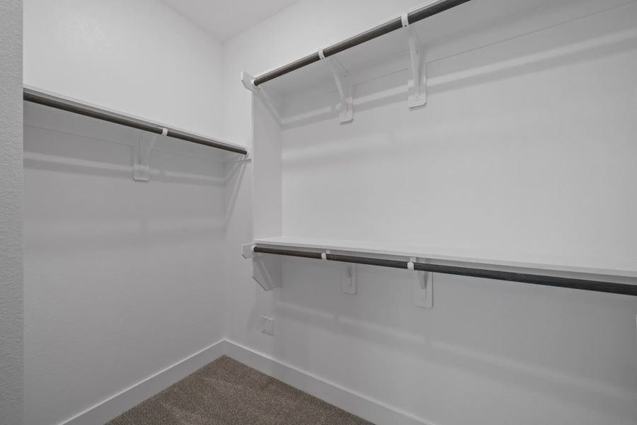 Representative unfurnished interior of a home built from the Carriagehouse by Chesmar Homes in Meridiana Townhomes, Iowa Colony (Image 88).