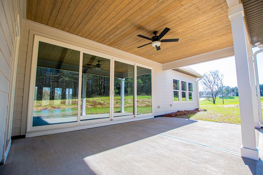 Exterior details and patio area of a home in The Reserve at Red Oaks, Carrollton (Image 20).