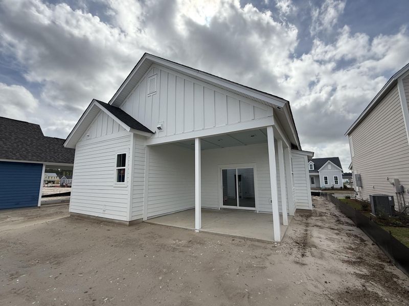 Exterior details and patio area of a home in The Domus Collection at Midtown Nexton, Summerville (Image 15).