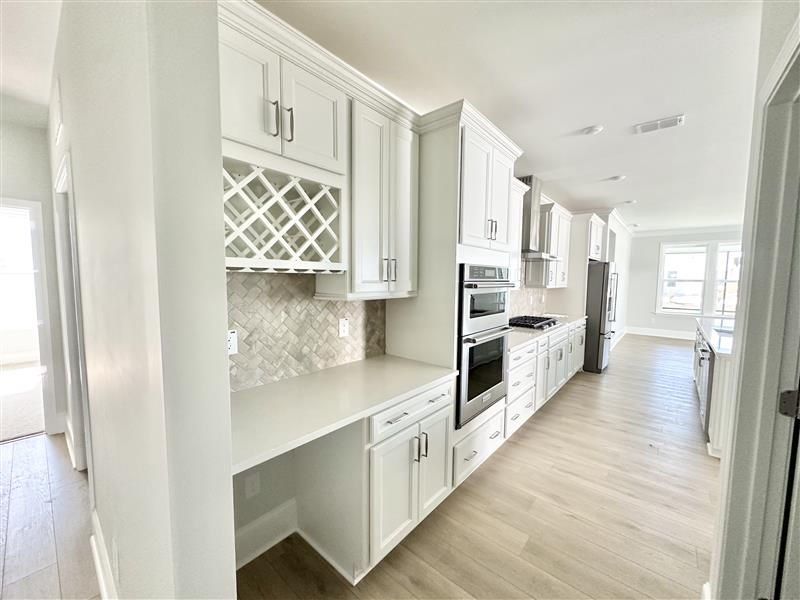Furnished interior view inside a new home in Del Webb Wilmington at Mallory Creek, Leland (Image 5).