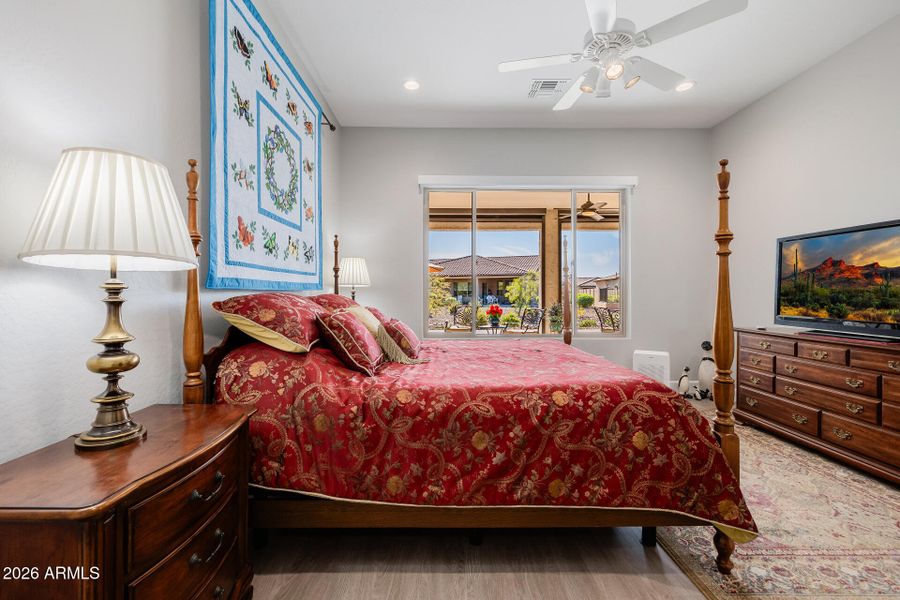 Primary bedroom w/remote shades