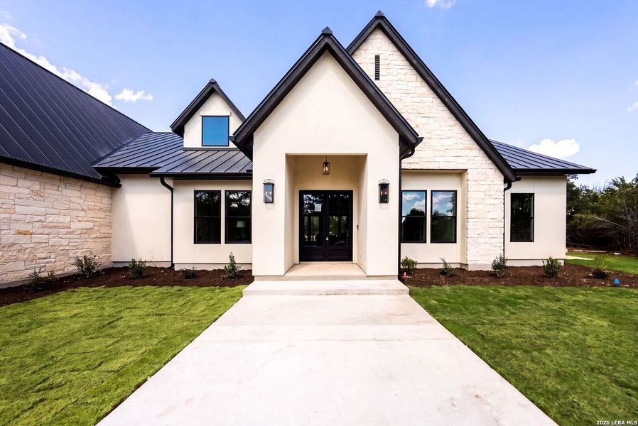 Front exterior of a new home in , Boerne, TX, highlighting curb appeal (Image 25).