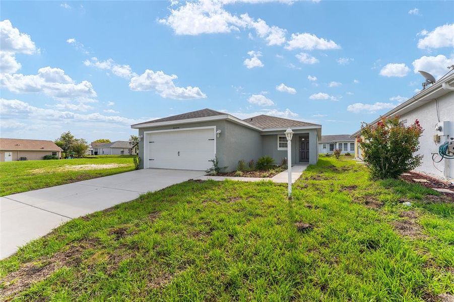 Front exterior of a new home in , Floral City, FL, highlighting curb appeal (Image 25).