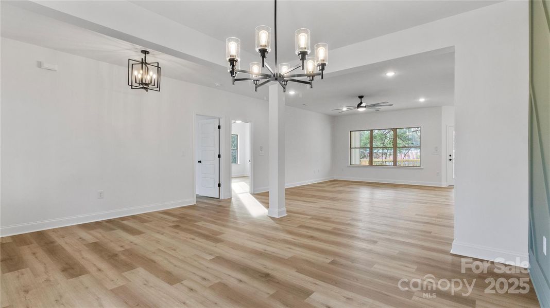 View from dining room toward family room & primary bedroom