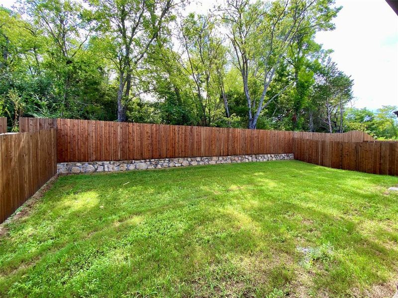 PRIVATE backyard with mature tree line behind. PRIVATE backyard with mature tree line behind.