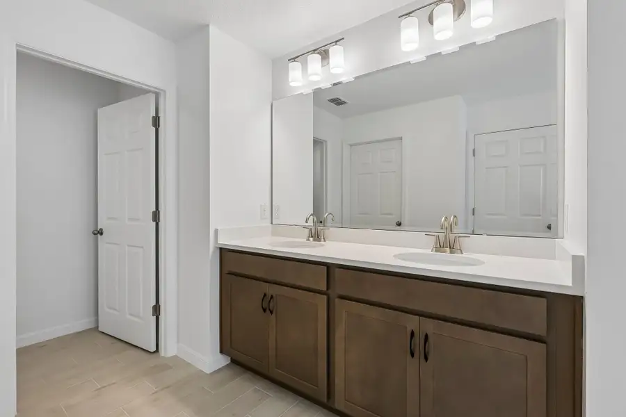 Furnished interior view inside a new home in Harrell Oaks, Orlando (Image 6).