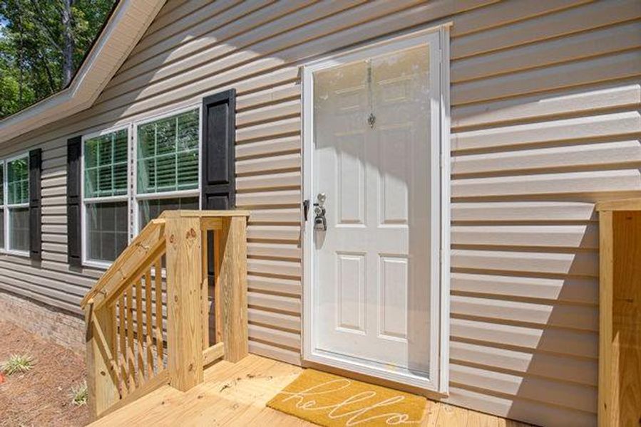 Exterior details and patio area of a home in , Clarkesville (Image 24).
