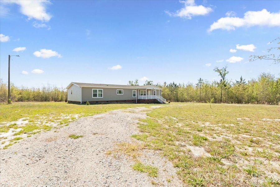 Exterior details and patio area of a home in , Bennettsville (Image 25).