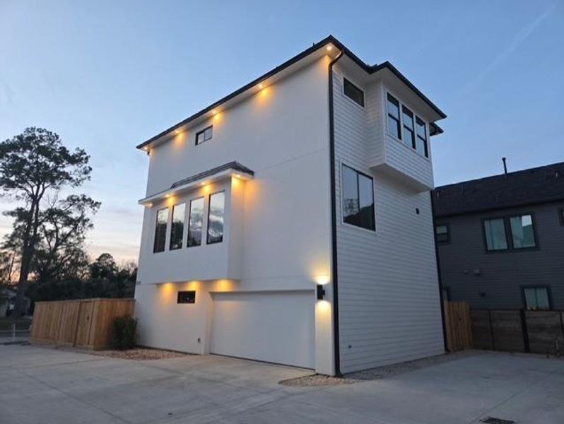 Exterior details and patio area of a home in , Houston (Image 3).