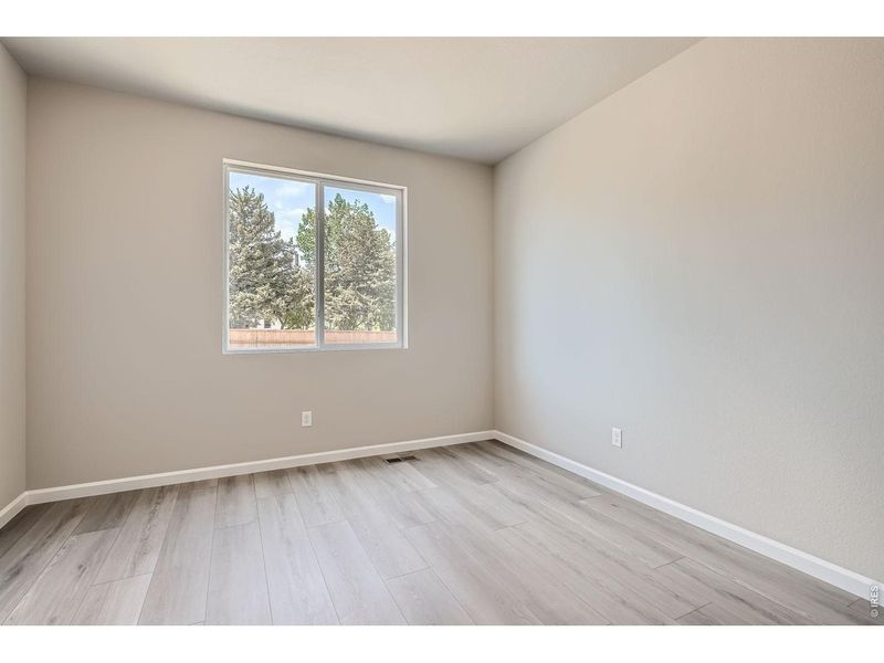 Spacious, unfurnished interior of a new home in Farmstead, Berthoud (Image 31).