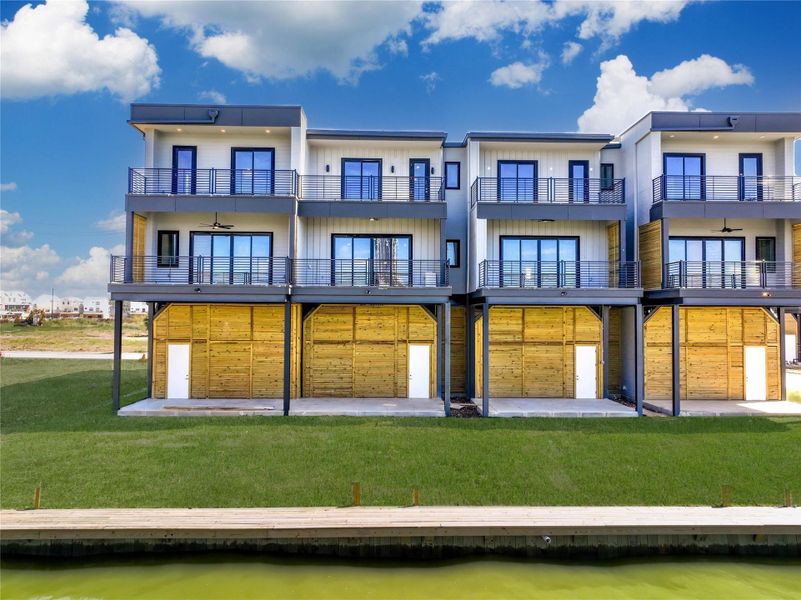 Front exterior of a new home in Lago Pointe, Seabrook, TX, highlighting curb appeal (Image 2). Front exterior of a new home in Lago Pointe, Seabrook, TX, highlighting curb appeal (Image 2).
