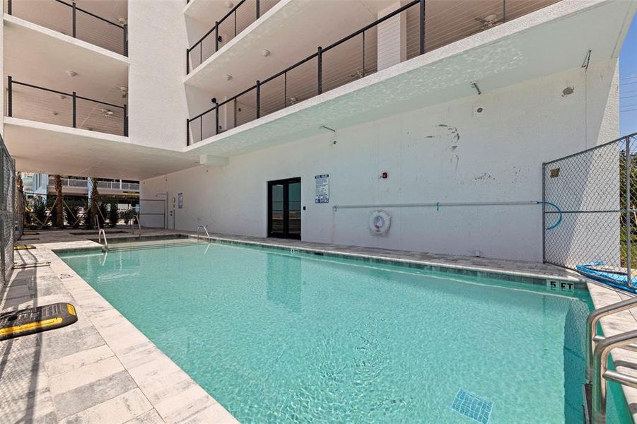 Condo located in Madeira Beach, FL showcasing its design and architecture (Image 3).