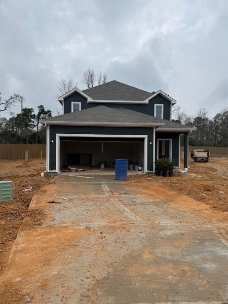 In-progress construction of a new home in River's Edge, Conroe, TX (Image 34).