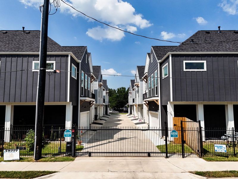 Front exterior of a new home in , Houston, TX, highlighting curb appeal (Image 21).