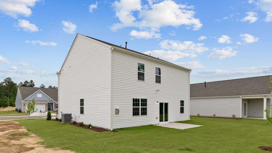 Exterior details and patio area of a home in West New Bern, New Bern (Image 3).