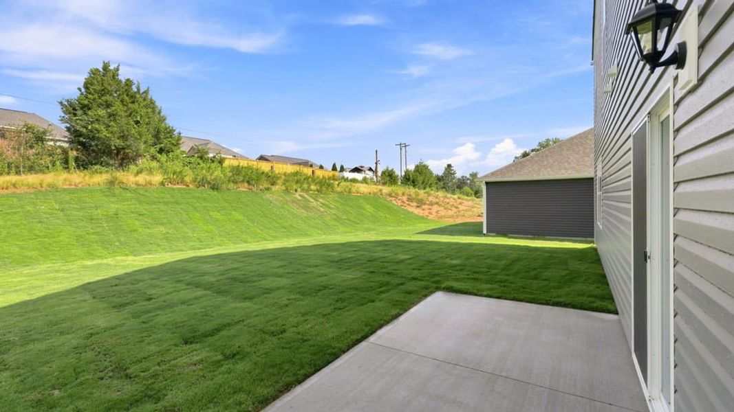 Exterior details and patio area of a home in Chestnut Ridge, Greenville (Image 22).