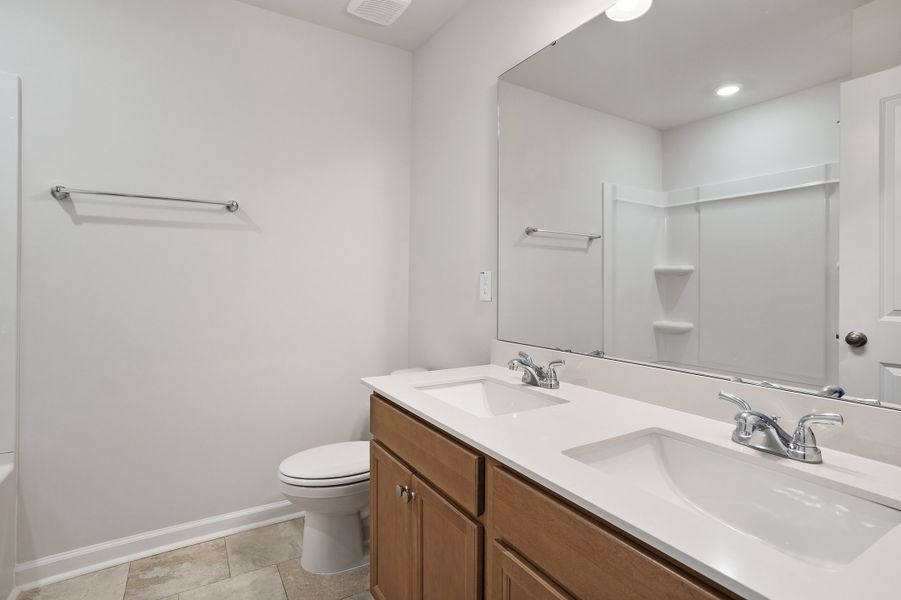 Furnished interior view inside a new home in Cambridge Reserve, Angier (Image 15).