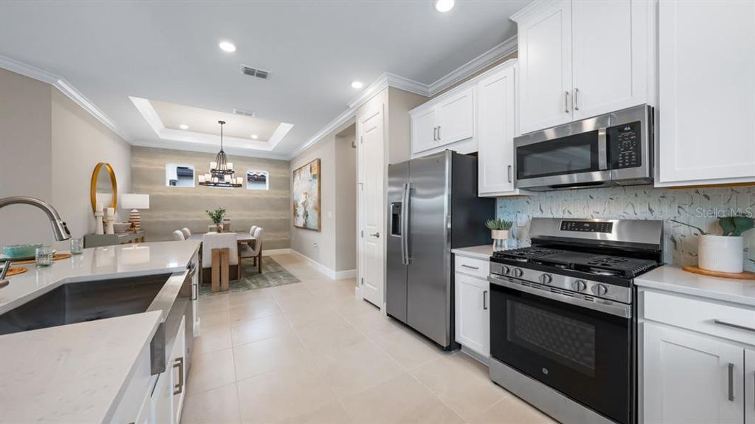 Furnished interior view inside a new home in Esplanade at Wiregrass Ranch, Wesley Chapel (Image 8).